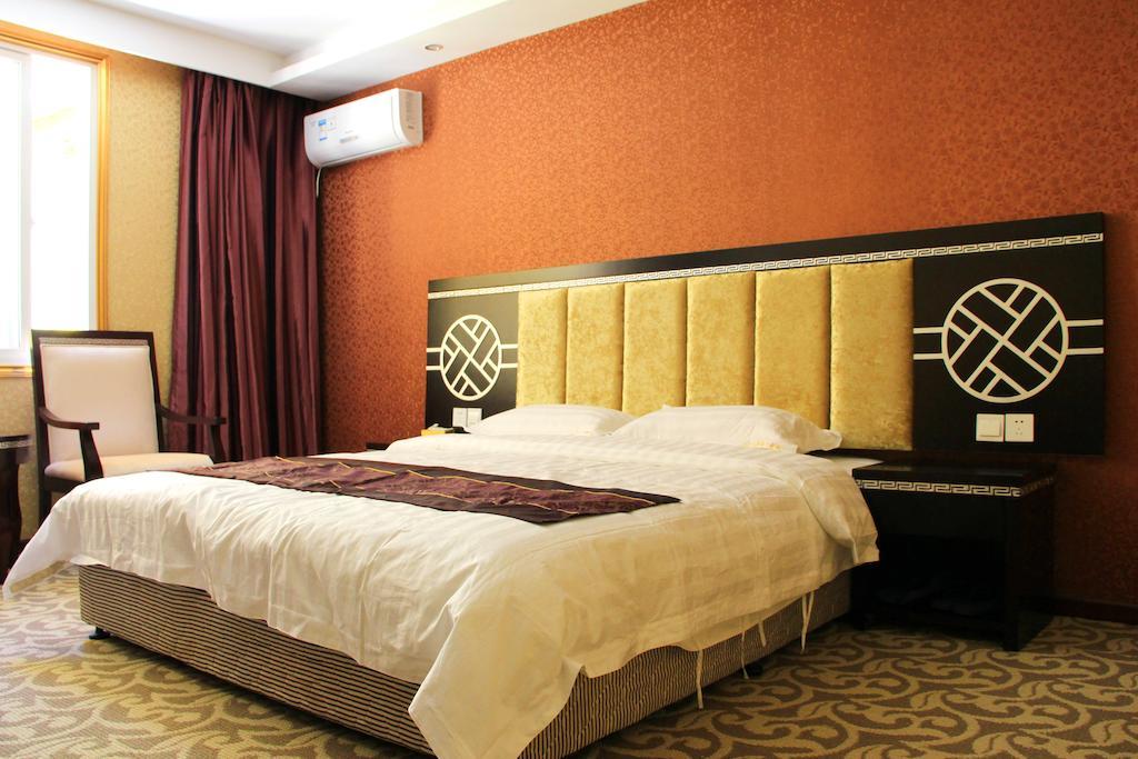 Jiuxiang Hotel Csiucsajkou Szoba fotó