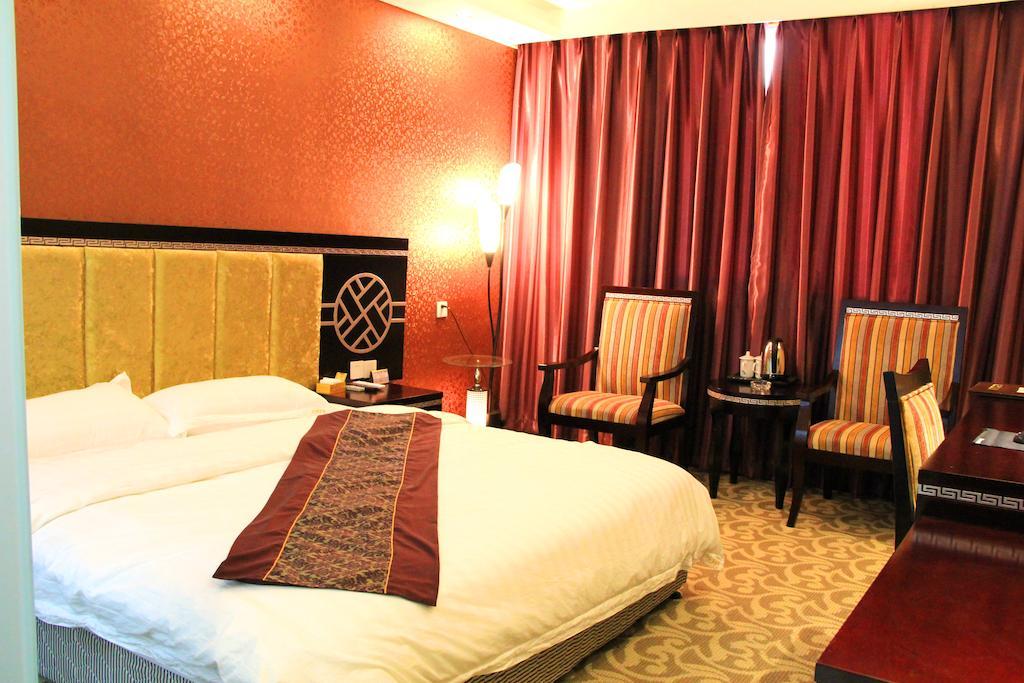 Jiuxiang Hotel Csiucsajkou Szoba fotó