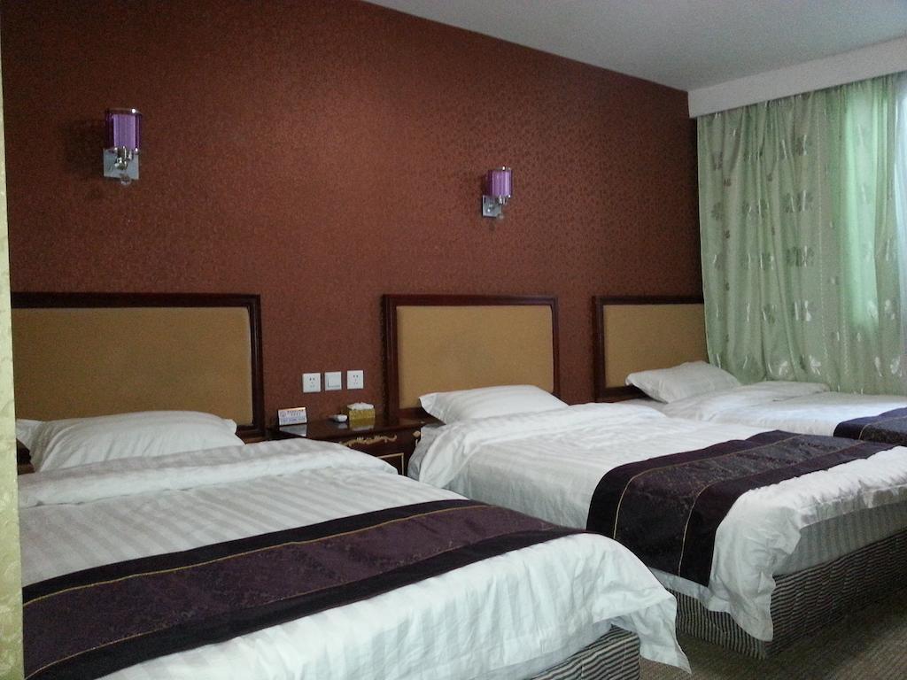 Jiuxiang Hotel Csiucsajkou Szoba fotó