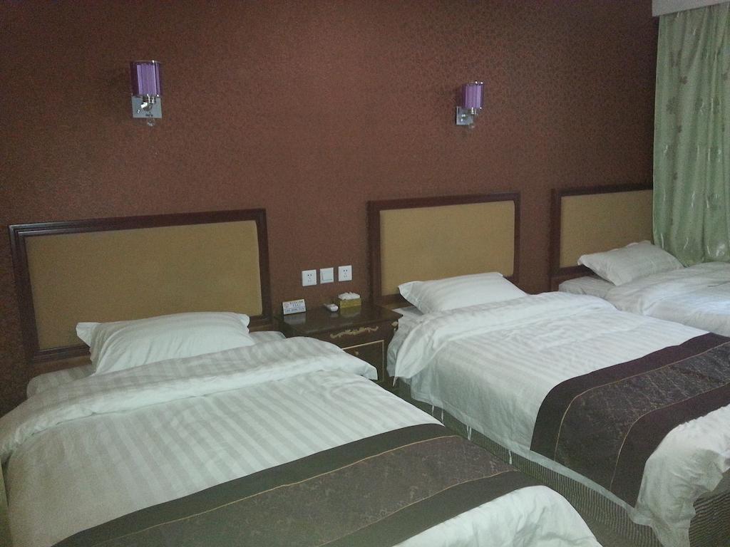 Jiuxiang Hotel Csiucsajkou Szoba fotó