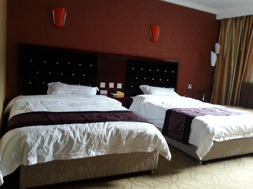 Jiuxiang Hotel Csiucsajkou Szoba fotó