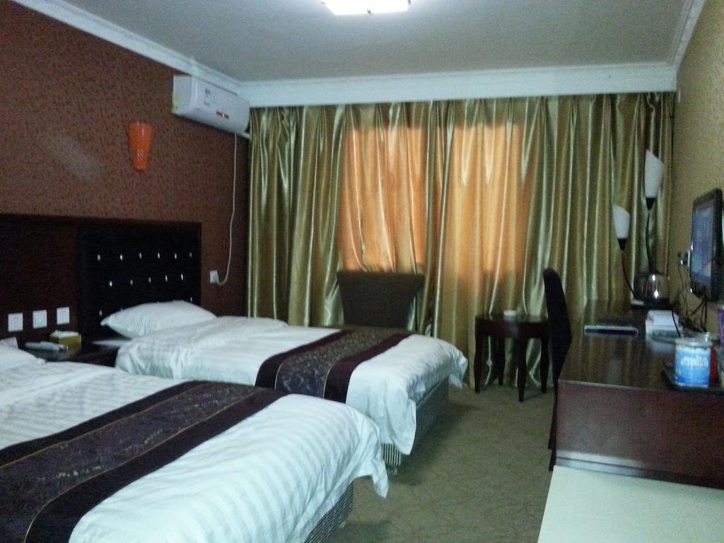 Jiuxiang Hotel Csiucsajkou Szoba fotó